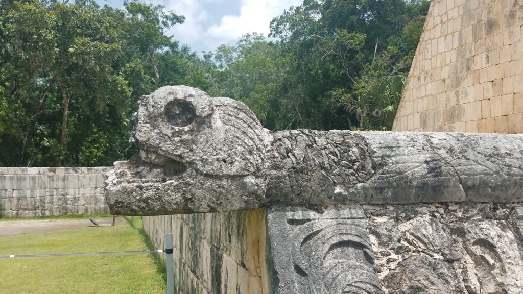 detailed carving of a serpent at Chichen Itza
