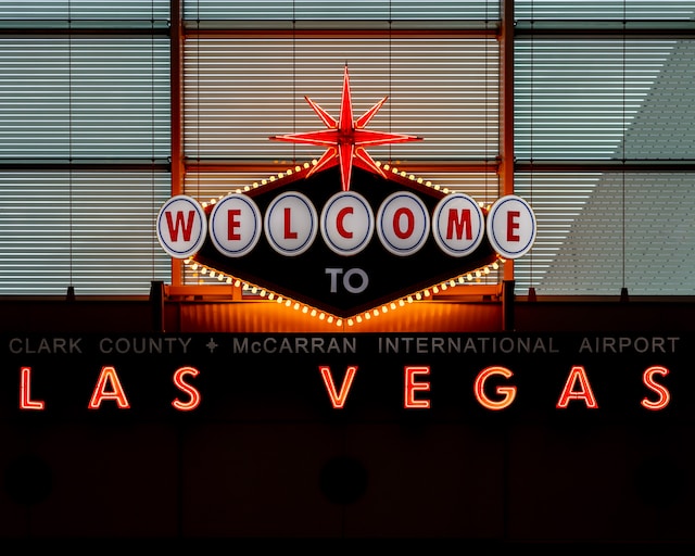 Photo by the blowup welcome to las vegas sign at McCarren Airport